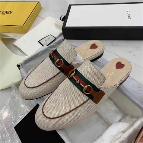 how to wear white gucci flops|stylish Gucci slides.